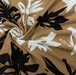 TKANINA WISKOZA KRESZ DRUK BIAŁO CZARNE LIŚCIE NA BEŻOWYM TLE ID5012158/001