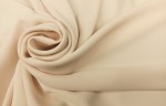 TKANINA LEJĄCA ODZIEŻOWA MELA GŁADKA JASNY BEŻ UN58026/00060 LIGHT BEIGE